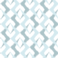 Ikat seamless colorful  geometric pattern. Abstract background texture.