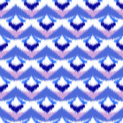 Fototapeta na wymiar Ikat seamless colorful geometric pattern. Abstract background texture.