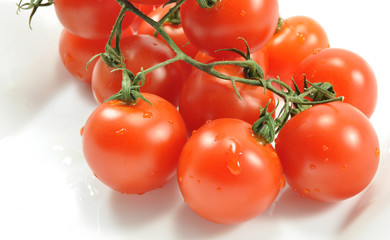 Beautiful tomatoes on a white background