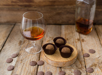 sweets and a glass of alcohol