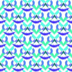 Ikat seamless colorful  geometric pattern. Abstract background texture.