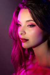Fototapeta premium Colorful portrait of a pretty young sensual woman