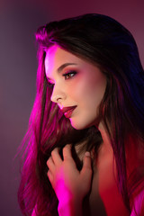 Colorful portrait of a pretty young sensual woman