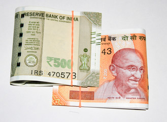 The brand new Indian currency bank notes of 200 and 500 ruppes bundle. First profit from business