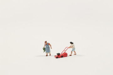 miniature mini figures with planting tree and tree stump,