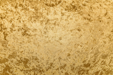 golden velvet fabric textured close-up detail