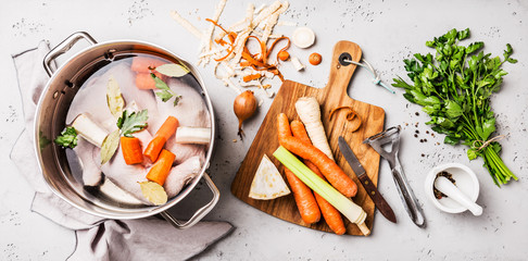 Cooking - chicken stock (broth or bouillon) with vegetables - obrazy, fototapety, plakaty