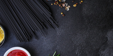 Obraz na płótnie Canvas pasta spaghetti with cuttlefish ink (healthy eating, black color) menu concept. food background. top view. copy space