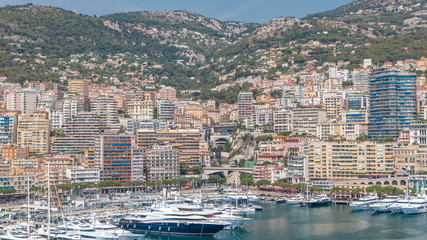 Monte Carlo city aerial panorama timelapse. View of luxury yachts and apartments in harbor of...