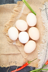 A pile of fresh raw eggs