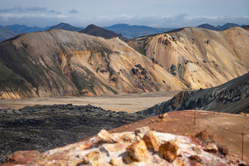Landmannalaugar Valley. Iceland. Colorful mountains on the Laugavegur hiking trail. The combination of layers of multi-colored rocks, minerals, grass and moss