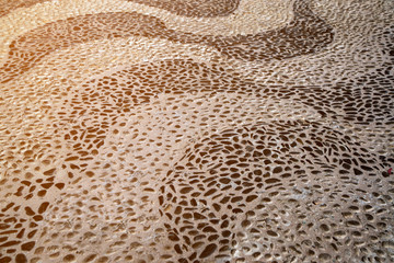 Stone paving background - granite cobblestone pattern in Pattay, Thailand.