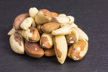 heap of almonds, cashew and brazil nuts