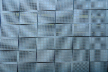 Perforated facade cladding of Dongdaemun Design Plaza or DDP in Seoul, Korea