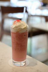 A glass of Red Velvet Shake on the table