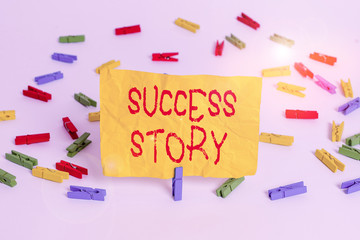 Word writing text Success Story. Business photo showcasing someone or something that has attain a goal Successful demonstrating Colored clothespin papers empty reminder white floor background office