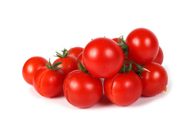Red cherry tomatoes isolated on white