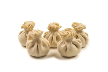 Khinkali on white background.