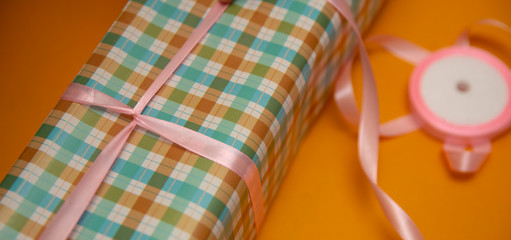 gift boxes on a yellow background, place for an inscription for free