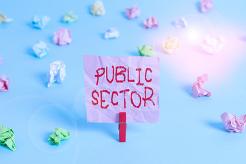 Writing note showing Public Sector. Business concept for the part of an economy that is controlled by the state Colored crumpled rectangle shaped reminder paper light blue background