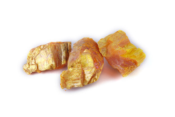 Auripigment (orpiment, arsenic mineral) isolated on white