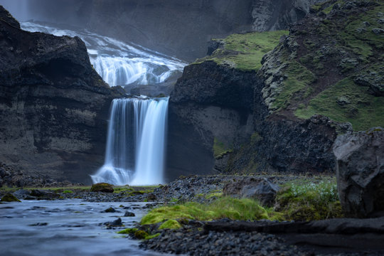 Two-tiered waterfall Ofaerufoss in the Eldgja canyon, in the central Iceland © Hladchenko Viktor