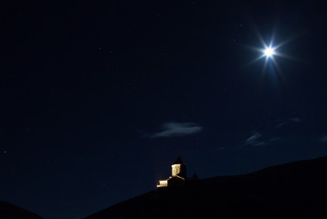 trinity church in Kazbegi Georgia at night