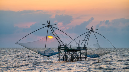 Square dip net with sunrise at Pakpra, Phatthalung, Thailand