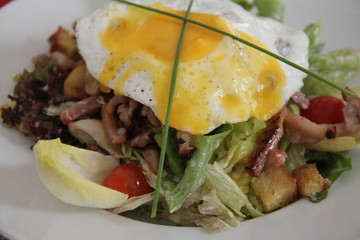 Peasant salad bacon croutons fried egg