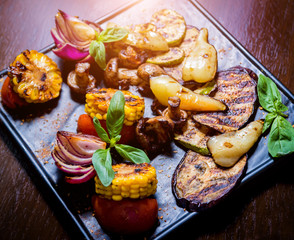 Tasty grilled vegetables on big plate. Healthy food. Restaurant.