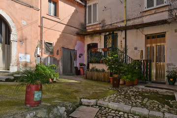 Montesarchio, Italy, 02/29/2020. A narrow street between the old houses of a medieval village.