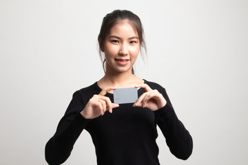 Young Asian woman smile with  blank card.