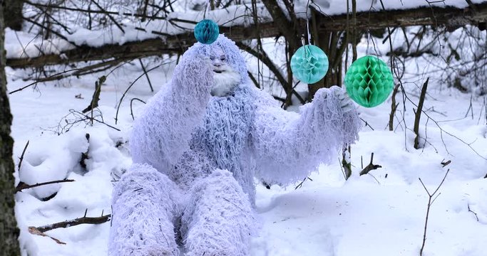 Yeti fairy tale character in winter forest. 3 in 1 outdoor fantasy 4K footage.