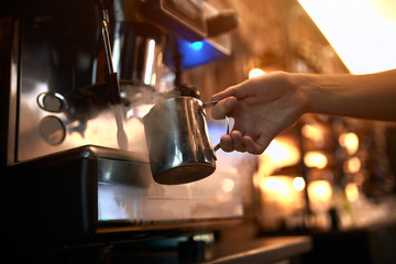 guy working on coffee business, busy working day at coffee shop. close up side view photo