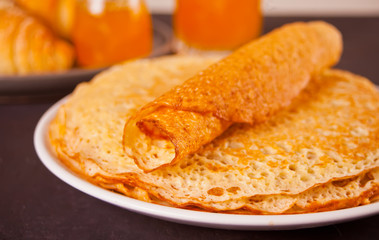 homemade russian thin tasty pancakes on the plate.