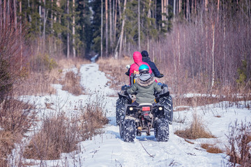 Family on the ATV Quad Bikes. © serjiob74