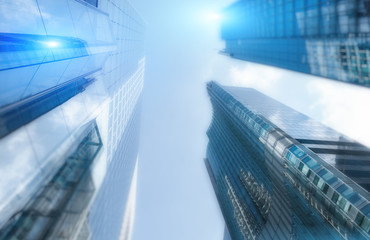Fototapeta na wymiar Modern skyscrapers. Double Exposure Future Blurred Background.