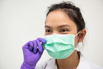 Asian women wearing protective masks,select focus.