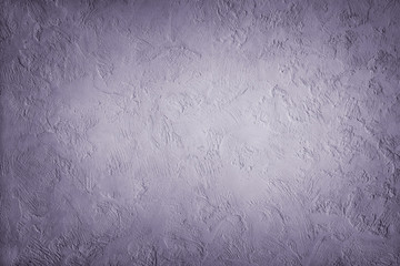 Grey-violet texture decorative background Venetian stucco for backgrounds shaded around the edge