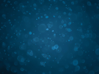 Abstract blue bokeh background. Defocused background. Blurred bright light.