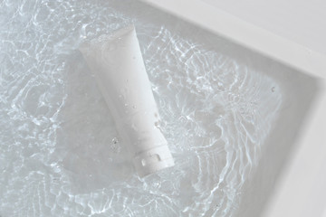 beauty treatment medical skincare and cosmetic lotion cream serum oil mockup bottle packaging product on water splash background, healthcare and medicine concept