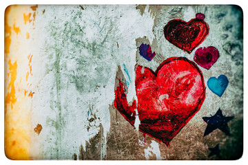 Valentine's day with bright hearts on a background of an old wall