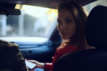 spring trip on a car girl portrait