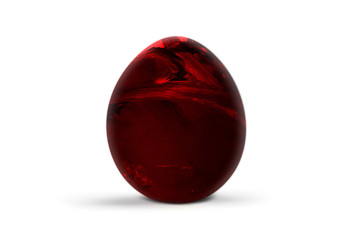 Red easter egg isolated on white background. Abstract colorful pattern