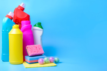 Set of cleaning supplies on color background