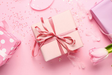 Beautiful gifts on color background