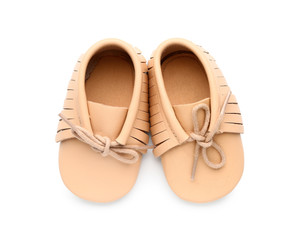Baby booties on white background