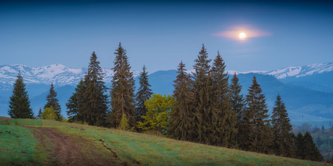 The full moon in a carpathian mountains