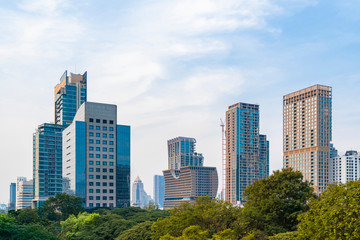 Obraz premium Aerial cityscape of picturesque Bangkok at daytime from rooftop. Panoramic skyline of the biggest city in Thailand. The concept of metropolis.