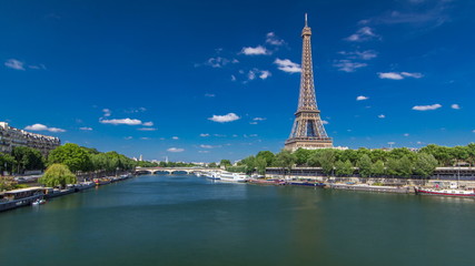 The Eiffel tower timelapse  from bridge over the river Seine in Paris